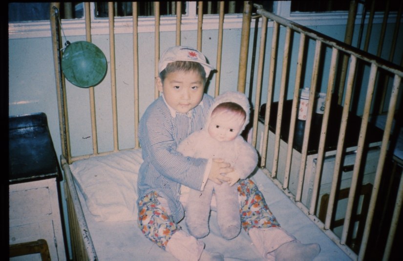 Chinese child with doll - 1986