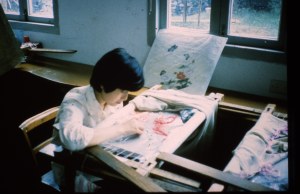 Young girls do intricate silk embroidery