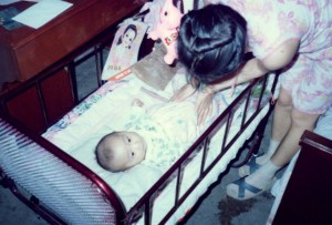 Mrs. Li tends her new baby boy.