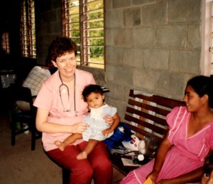 Pam holds beautiful Mayan baby girl.