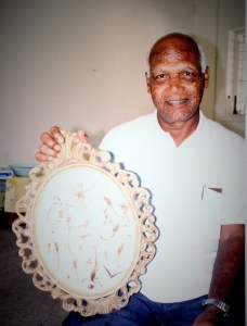 Pastor Gabriel with his scorpion collection