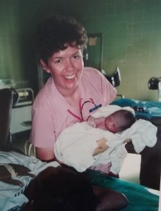 Holding the new baby after I delivered it!