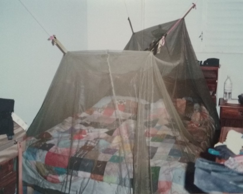 Mosquito netting in place to protect me from malaria.