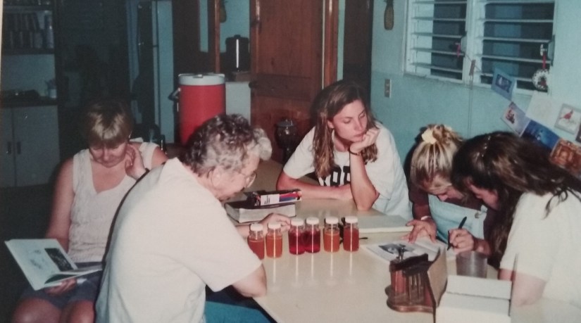 Watching Paula analyze village water samples.