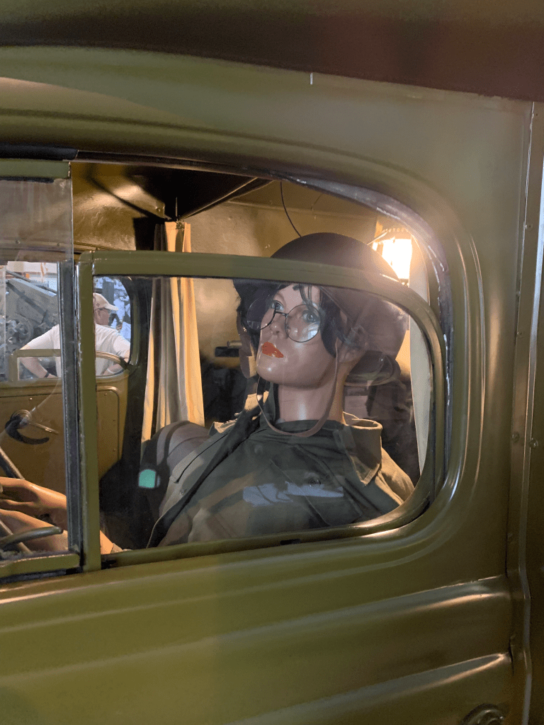 A model of Frances Slanger RN driving the ambulance into the combat zone.